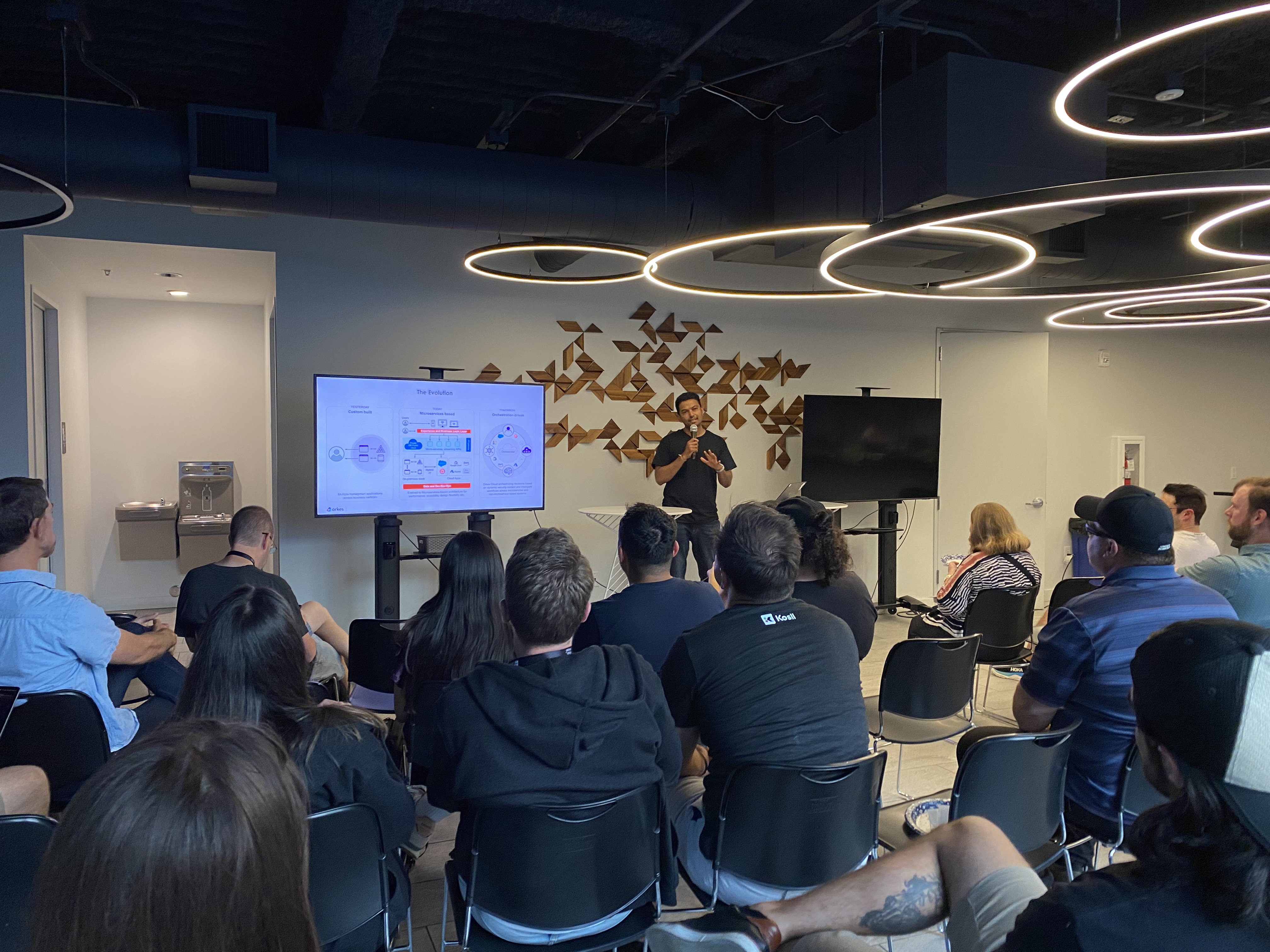 Image of Amit giving a lightning talk on orchestration and Orkes.