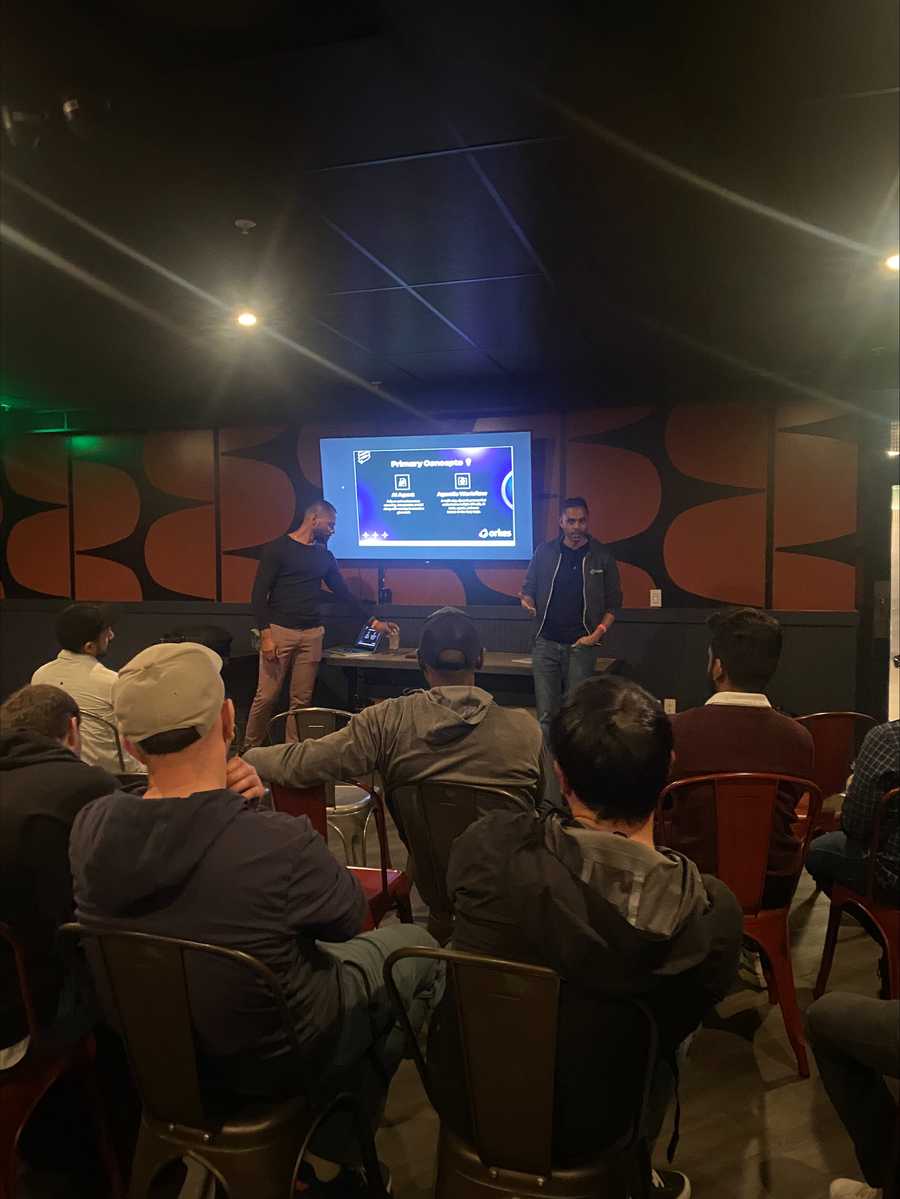 An image of our senior developer advocate and software engineer talking about agentic workflows and AI agents at the Seattle developer meetup.